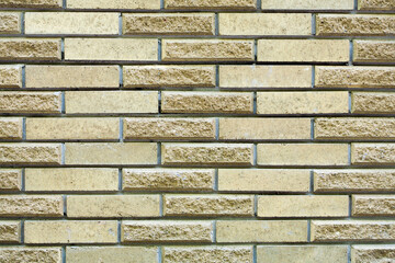 High resolution cream brick wall texture, background.