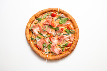 Pizza with prosciutto, cherry, arugula and basil isolated on white background