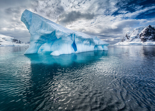 Large iceberg broken off of glacier floats near Antarctica