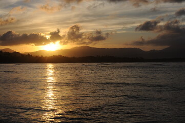 Fototapeta na wymiar Sea shorr sun set view with hills