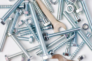 Repair tool. Bolts and wrenches. White background.