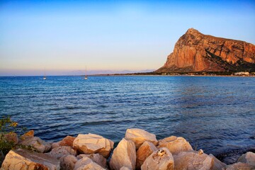 Sunset on the beach of San Vito Lo Capo, Sicily with view on Mount Monaco