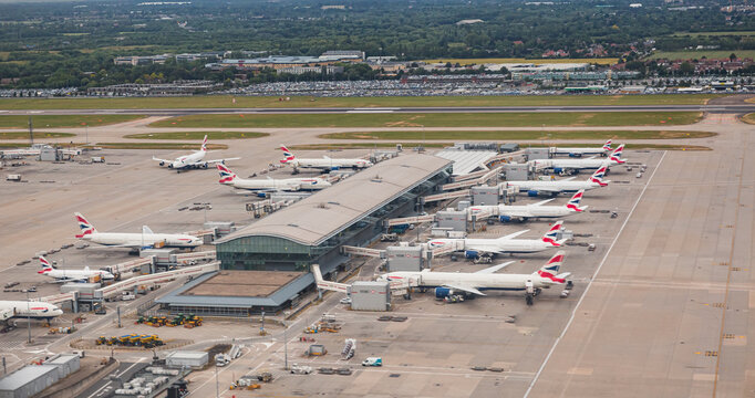 Heathrow, UK: Aerial View Over The Airplanes Parked At The Terminal   