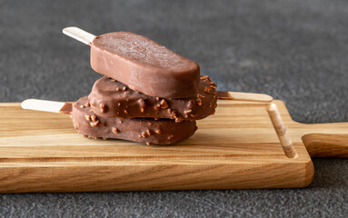 Chocolate-covered vanilla ice cream bars