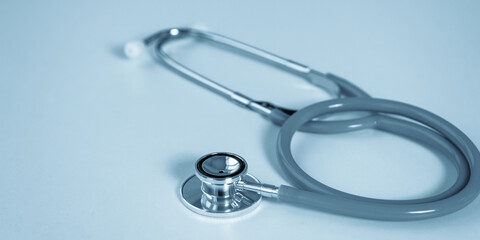 Stethoscope on a light background. Toning. Close up.
