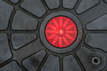 signal light in a metallic frame