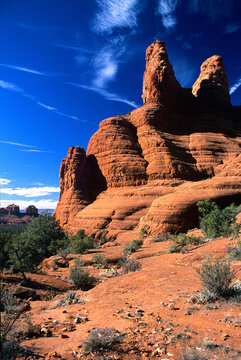 The Two Nuns (aka. Twin Buttes) Rock Formation looking to Cathedral Rock in Early Morning in Sedona Arizona USA.  In the Munds Mountain Wilderness Area. 
