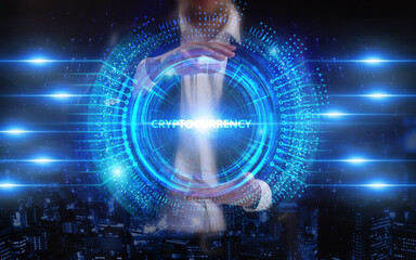 Business, Technology, Internet and network concept. Young businessman working on a virtual screen of the future and sees the inscription: Cryptocurrency