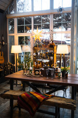 served table in a country house decorated for the Christmas holidays.