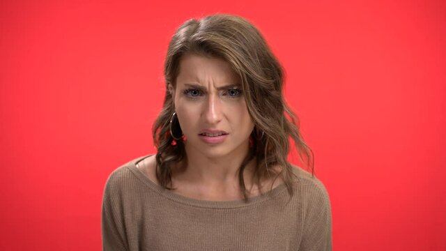 Women smiles then becomes disgusted  the angry expression change