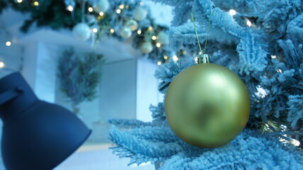 Christmas tree with balls, Golden ball on the tree