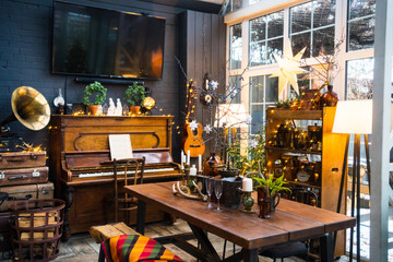 served table in a country house decorated for the Christmas holidays.
