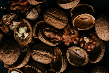 Walnuts background. Walnuts texture. Abstract walnuts heap pattern background