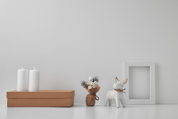 Porcelain figurine of a New Year's deer and New Year's, festive decor. Copy space, mock up.