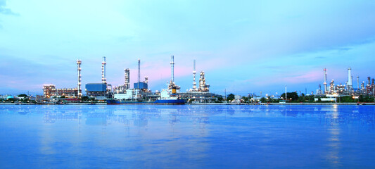 Fototapeta premium Refinery plant area at twilight panorama