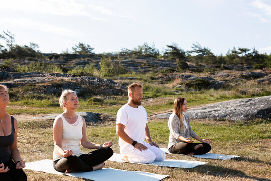 People meditating outdoor