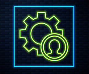 Fototapeta premium Glowing neon line Head hunting icon isolated on brick wall background. Business target or Employment sign. Human resource and recruitment for business. Vector.