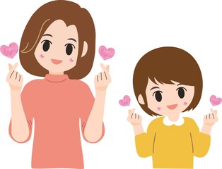 指でハートをつくる可愛い母娘