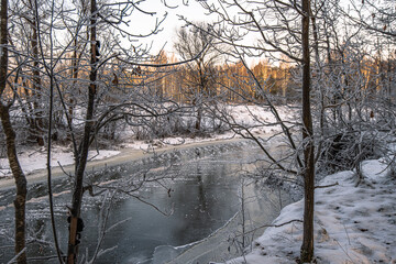 Frosty morning on a frozen river in the clouds of the Moscow region