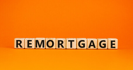 Remortgage symbol. 'Remortgage' written on wooden blocks. Business and remortgage concept. Copy space. Beautiful white background.