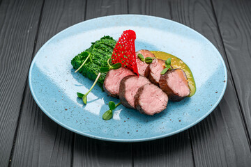 Juicy veal steak with spinach and mustard sauce