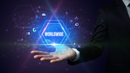 Man hand holding WORLDWIDE inscription, social media concept