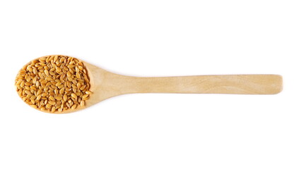 Golden linseed, linen seeds with wooden spoon isolated on white background, top view