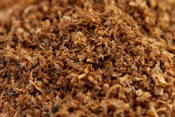 Pile of ground coriander on white background, spice