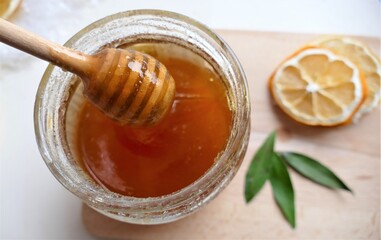 Honey with slice of lemon