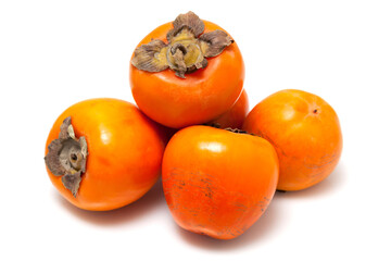 Ripe persimmon isolated on a white background