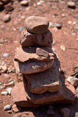 Fototapeta na wymiar Small stone pyramid in mountain
