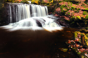 Tiger Clough waterfall in woodland
