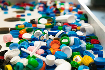 Background made with recycled plastic bottle caps