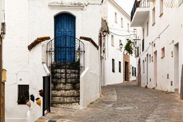 Blue Door in Narrow Street Cacares Spain