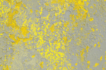 Rusty old painted yellow-gray metal background