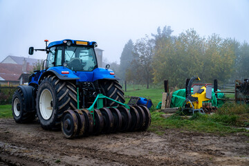 tractor on a farm in the countryside