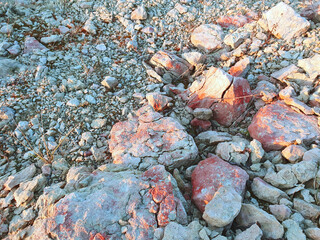 rocky-stone limestone rock, with white and pink hues, like a mountain miniature. excellent natural landscape background