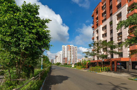City road with residential building complex at New Town, Rajarhat Kolkata