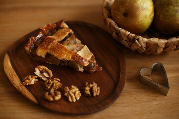 Piece Of  Apple Pie On Wooden Table