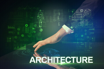 Businessman touching huge display with ARCHITECTURE inscription, modern technology concept