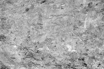 Texture of a concrete wall with cracks and scratches which can be used as a background