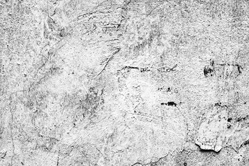 Texture of a concrete wall with cracks and scratches which can be used as a background