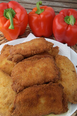 breaded pork tenderloin filled with ham and hot cheese as kids food