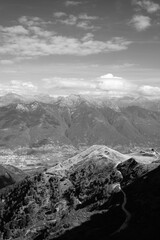 a mountain range with clouds