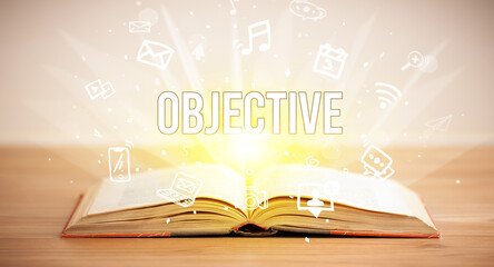 Opeen book with OBJECTIVE inscription, business concept