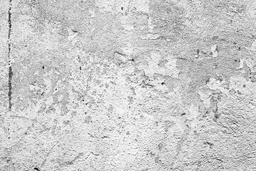 Texture of a concrete wall with cracks and scratches which can be used as a background