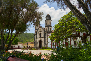 Fototapeta na wymiar beautiful old spanish colonial church in the town centre of Paicol, Colombia, South America