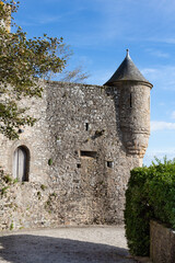 Tower in the ramparts of Mont Saint-Michel against blue sky