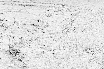 Texture of a concrete wall with cracks and scratches which can be used as a background