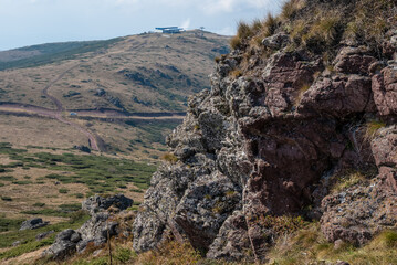 View from the top of Babin zub (The Grandmather's tooth) on Old mountain, which is the most beautiful peak of Stara planina ( Balkan mountains).The impressive and big striking rocks and dense plants.